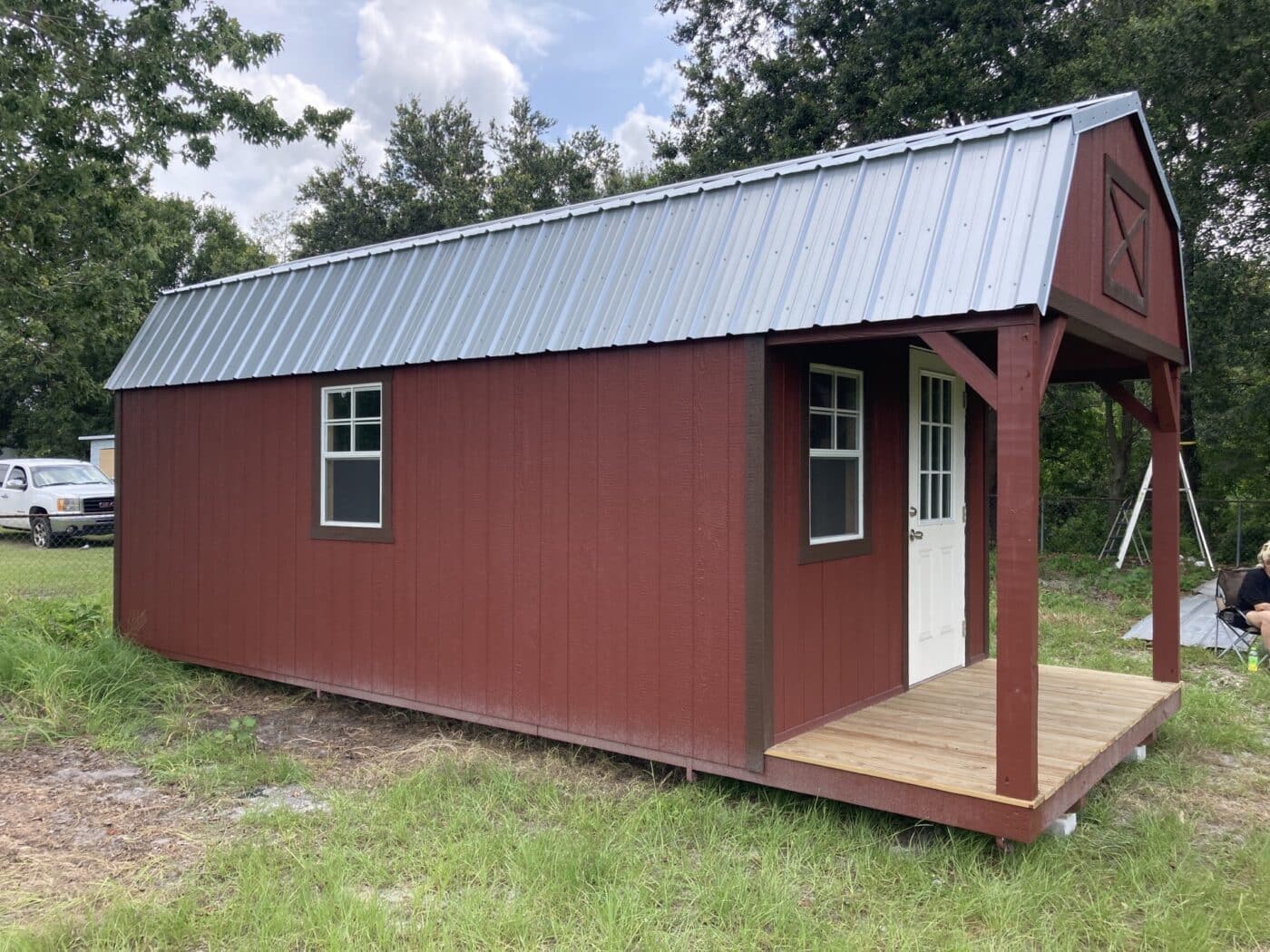 a red 12x26 cabin shed in florida