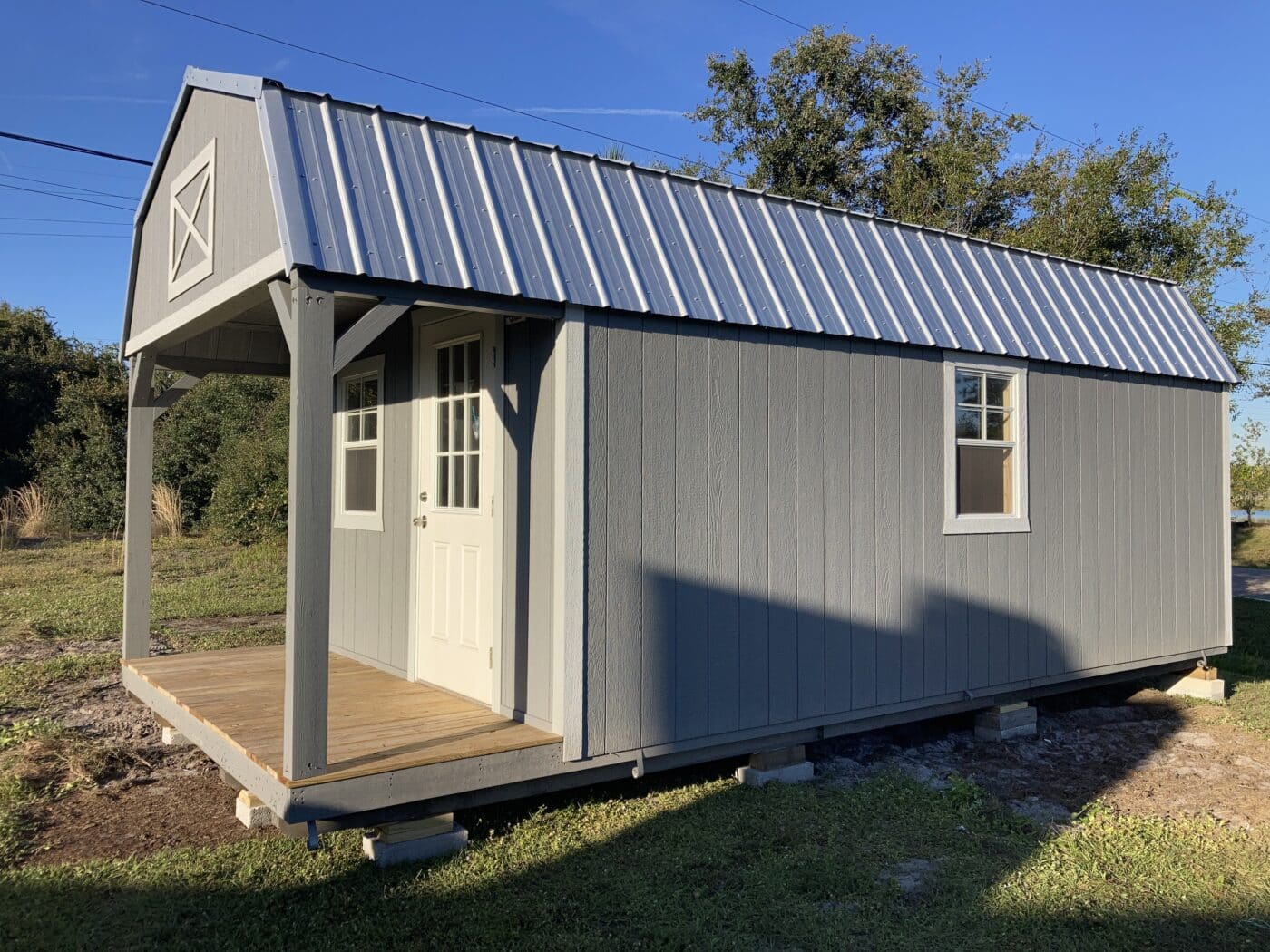 a grey 12x28 cabin shed in florida