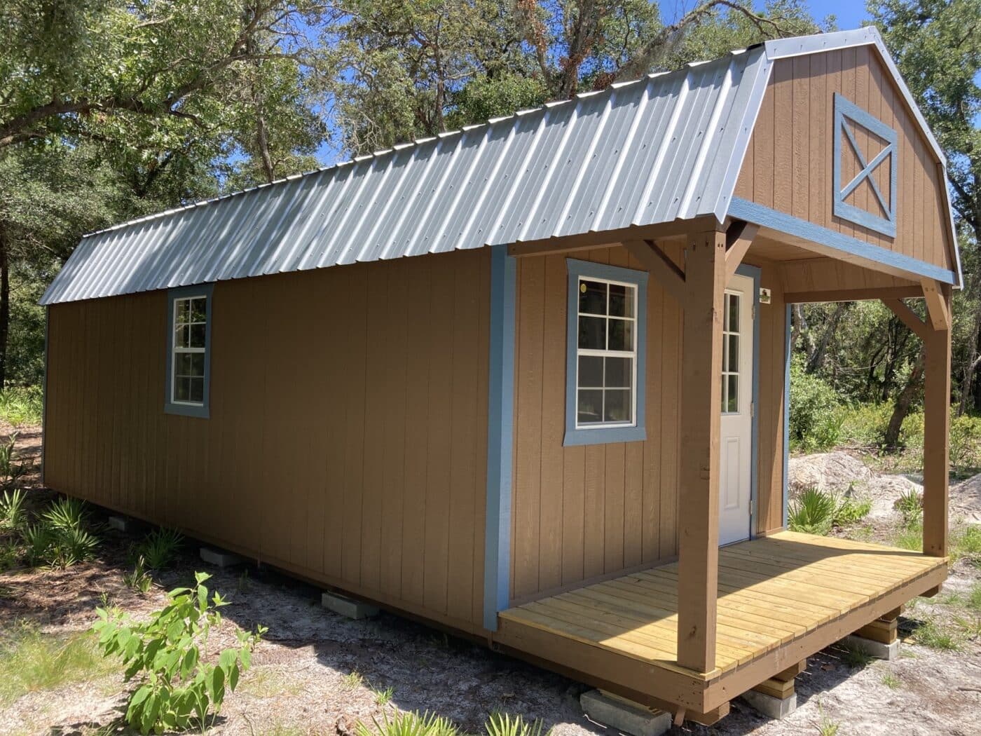 a brown 12x30 cabin shed in florida