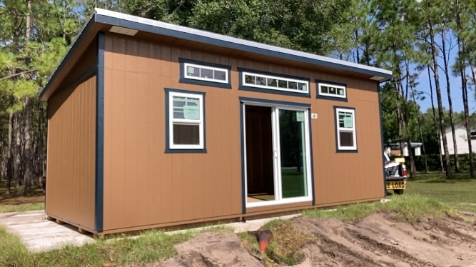 a brown 12x30 studio shed in florida